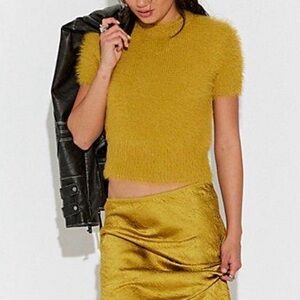 NWT free people Alexandra faux fur top. Brand new with tags S